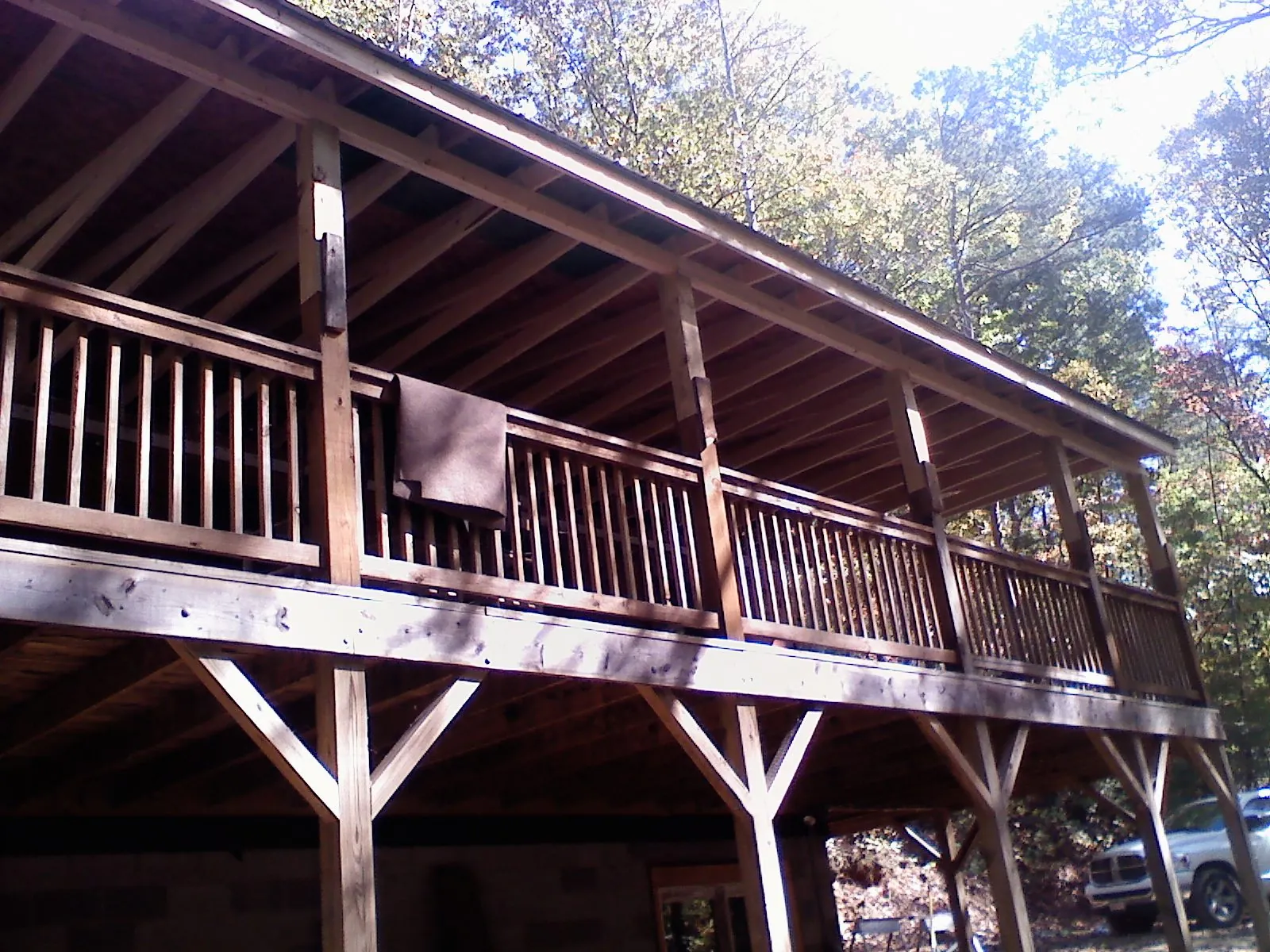 Timber framing under a new elevated porch and deck — Roof Leak Repair in Mays by Roofing Brothers